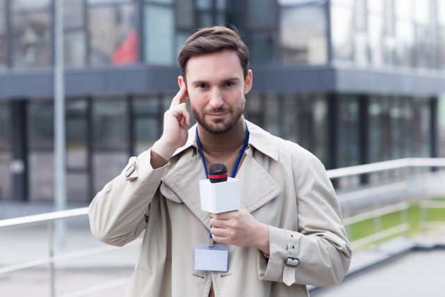 ニュースキャスター