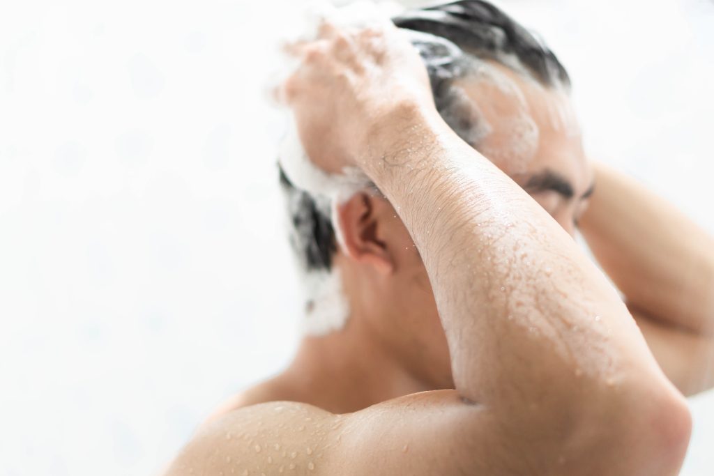 man washing hair